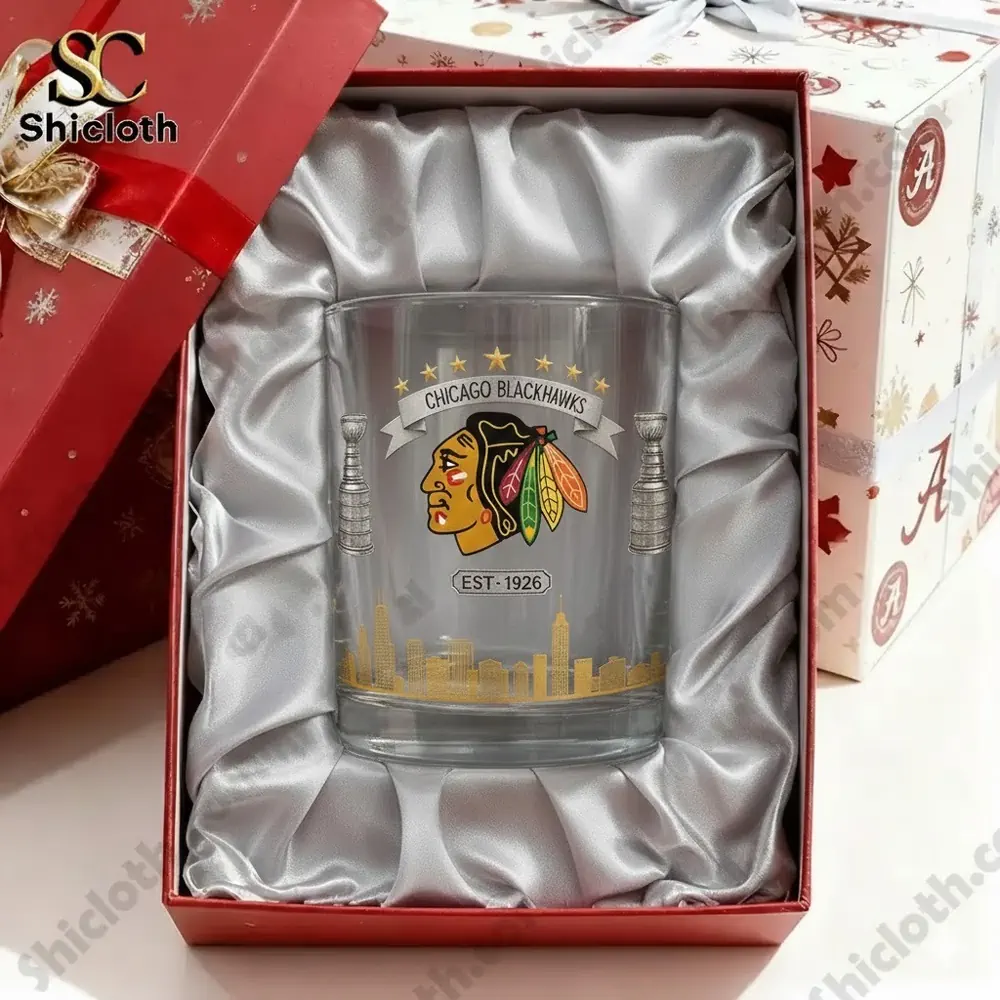 A Chicago Blackhawks themed glass displayed inside a silk lined gift box.