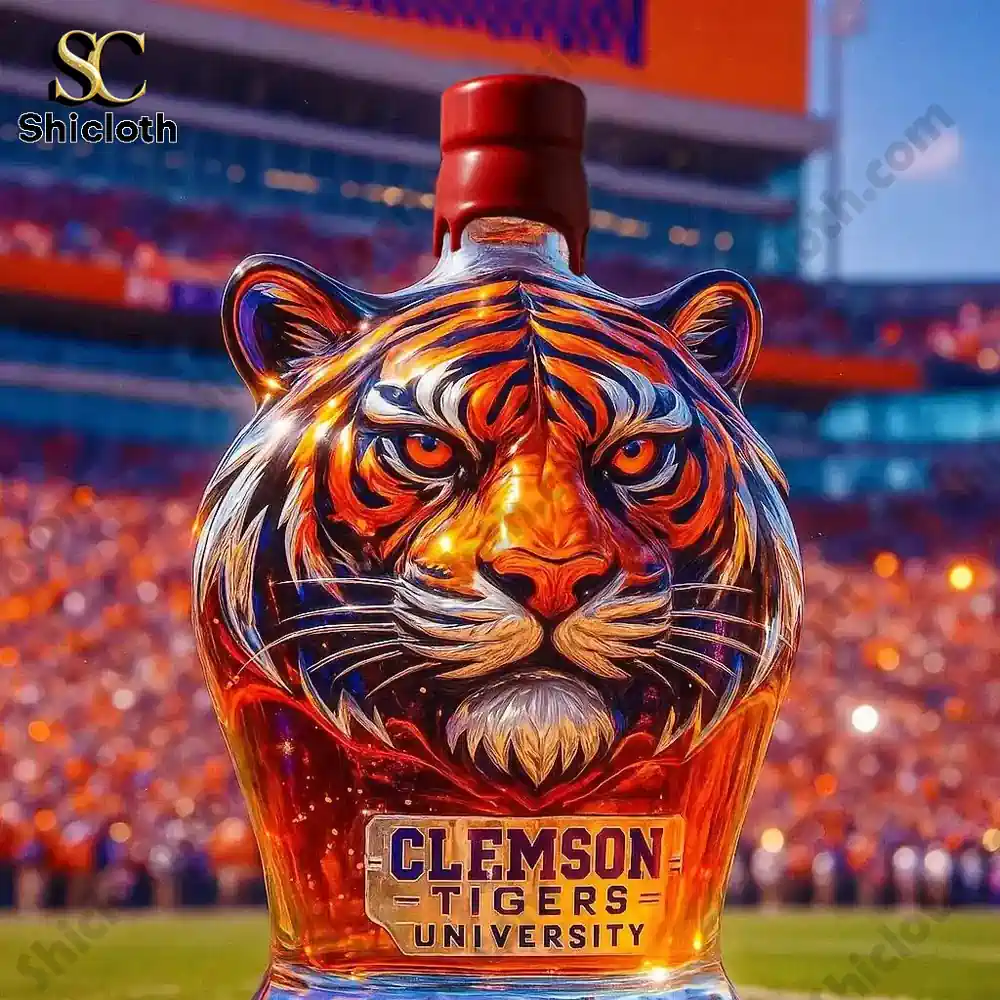 Clemson Tigers Christmas Gift Whiskey Bottle 4 Tiger head shaped bottle with a red cap displayed on a stadium field!