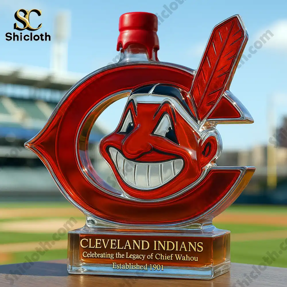 A Cleveland Indians shaped bottle with a red cap shown on a baseball field.