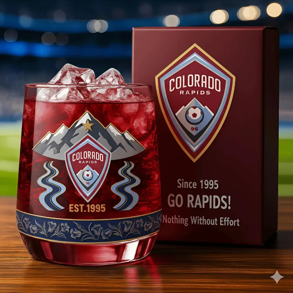 Colorado Rapids Christmas Whiskey Glass 3 A Colorado Rapids glass filled with ice next to a matching gift box set against a stadium backdrop!