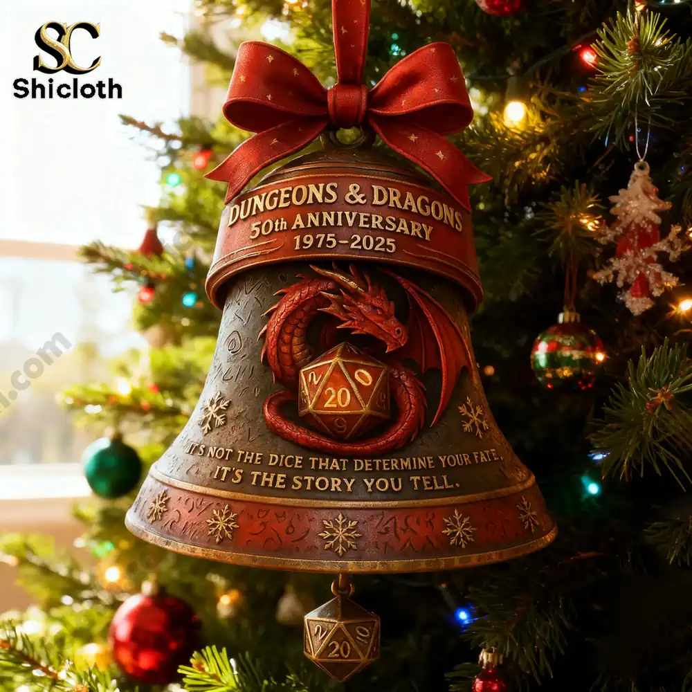 A detailed bell ornament with a dragon and a twenty sided dice hanging on a Christmas tree!