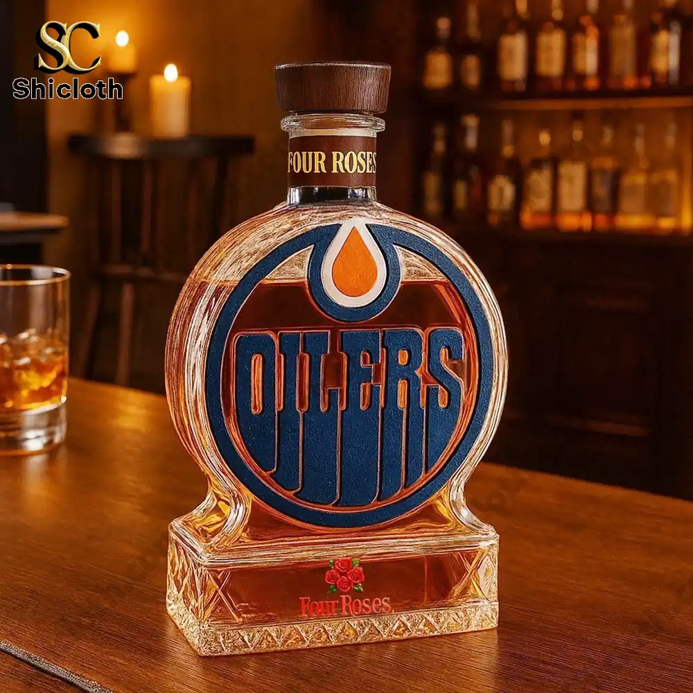 Edmonton Oilers Christmas Gift Whiskey Bottle 3 An Edmonton Oilers themed Four Roses style bottle displayed on a bar surface.