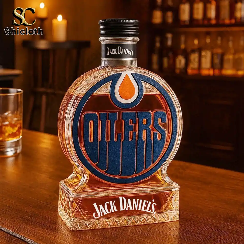 Edmonton Oilers Christmas Gift Whiskey Bottle 5 An Edmonton Oilers themed bottle styled after Jack Daniels on a bar counter.