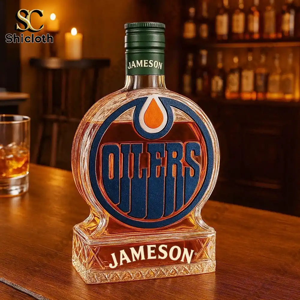 Edmonton Oilers Christmas Gift Whiskey Bottle 7 An Edmonton Oilers themed bottle styled after Jameson sitting on a bar counter.