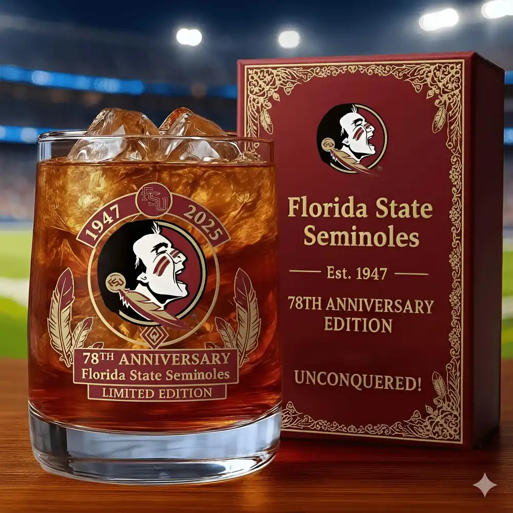 Florida State University Seminoles 78th Anniversary Christmas Whiskey Glass 3 A Florida State Seminoles anniversary glass with ice placed beside a matching red box with a stadium backdrop.