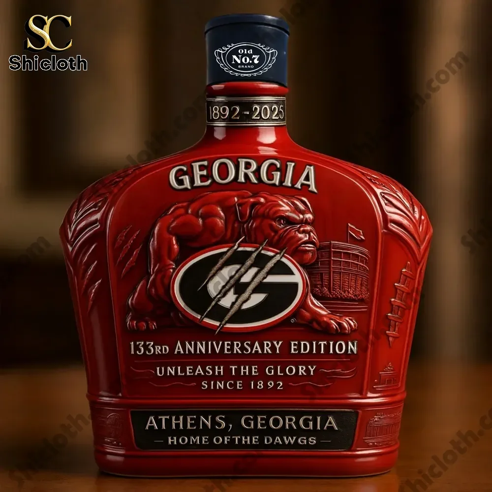 A red Georgia Bulldogs anniversary bottle with a blue cap and detailed embossed graphics!