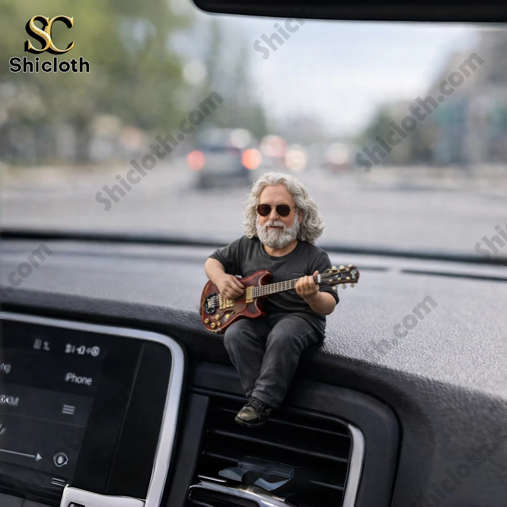 Grateful Dead inspired guitarist figurine on car dashboard!