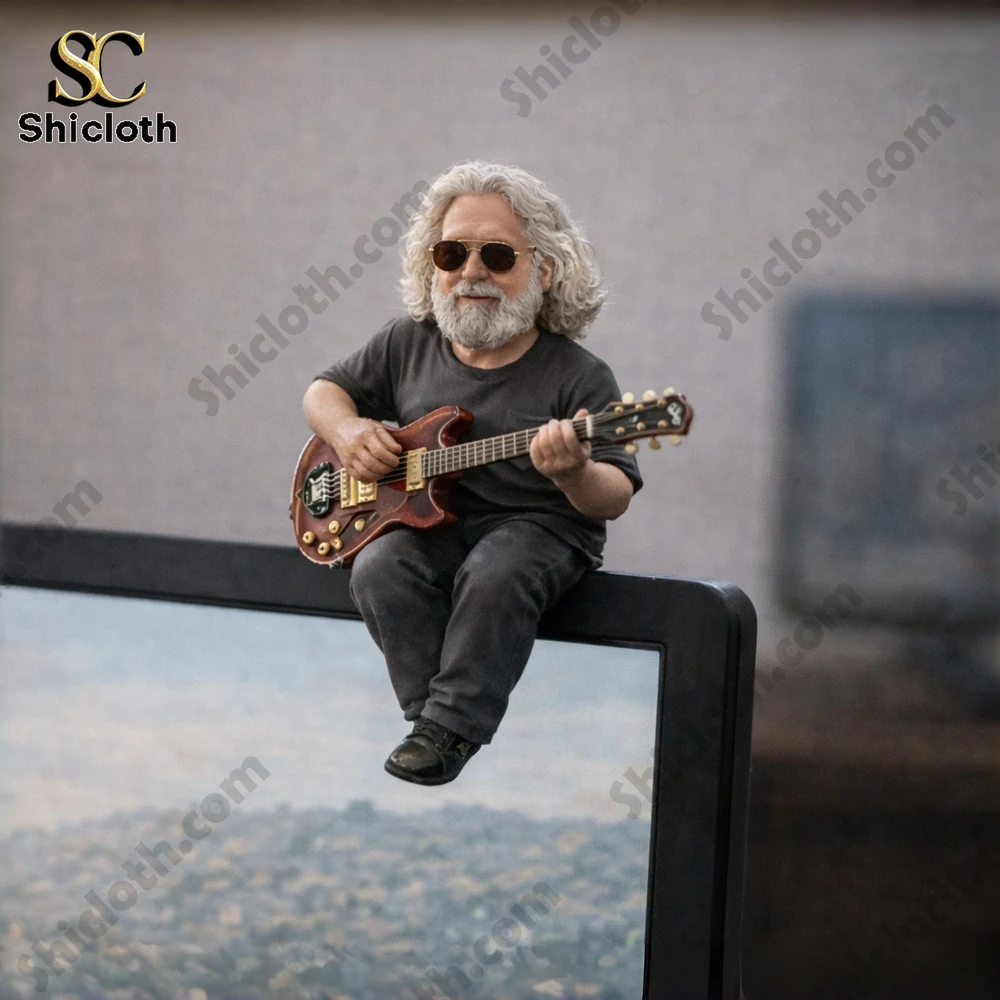 Grateful Dead inspired guitarist figurine on monitor edge!