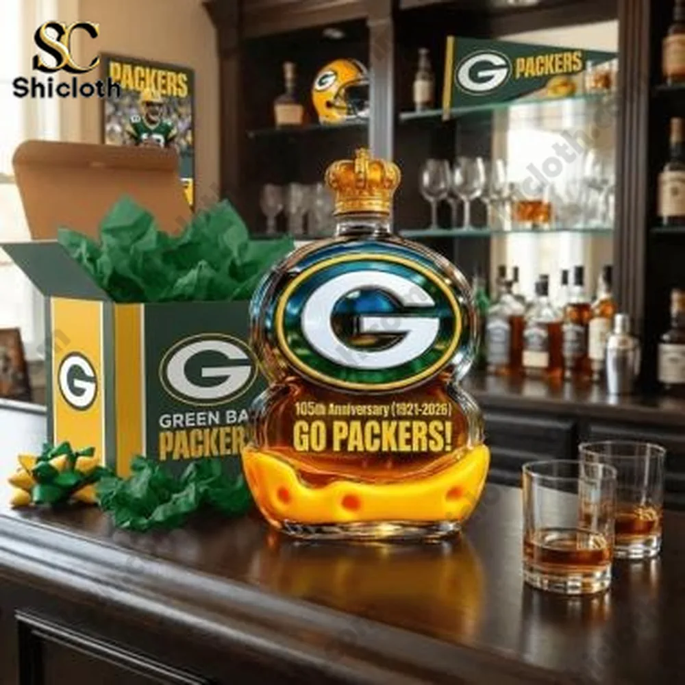 Green Bay Packers 105th Anniversary (1921-2026) Whiskey Bottle 1 Green Bay Packers themed decorative bottle on a wooden bar with gift box.