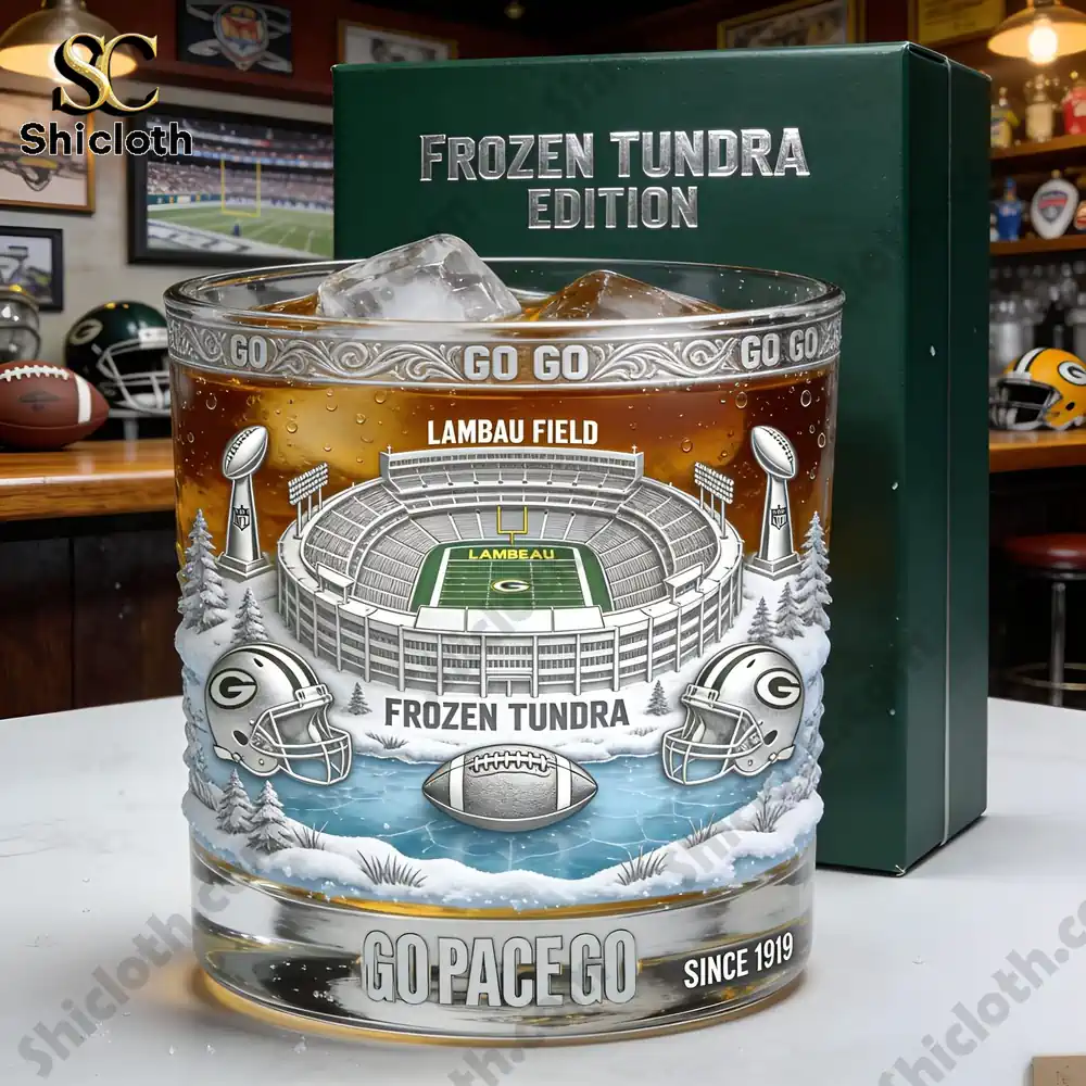Glass with a stadium design and ice cubes inside on a table in a sports themed room!