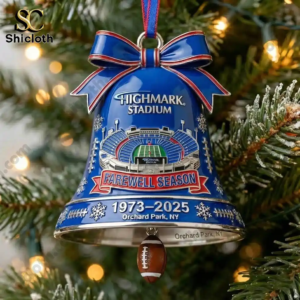 A close up of a Shicloth blue stadium themed farewell season bell ornament hanging on a tree.
