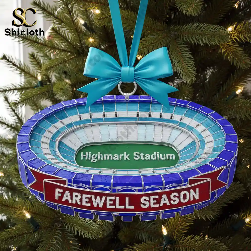 Close view of a stadium shaped ornament with a blue ribbon.