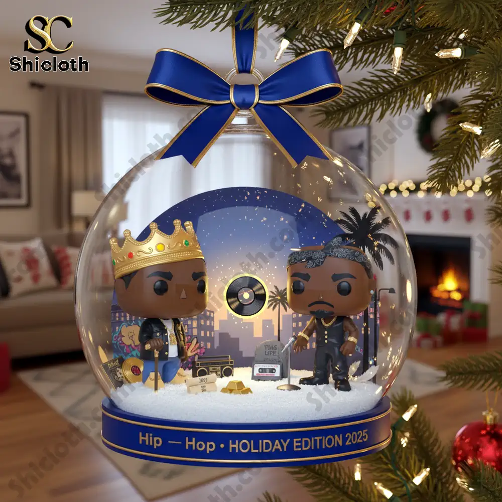 Hip-Hop Christmas Ornament 3 A clear ornament with two hip hop figures hangs on a decorated Christmas tree.