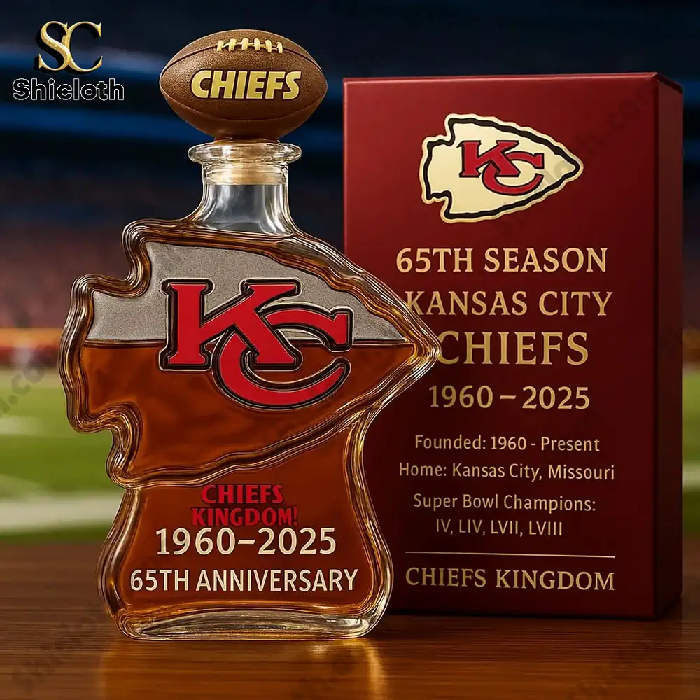 Close-up of Kansas City Chiefs 65th anniversary memorabilia featuring a football bottle and display box.