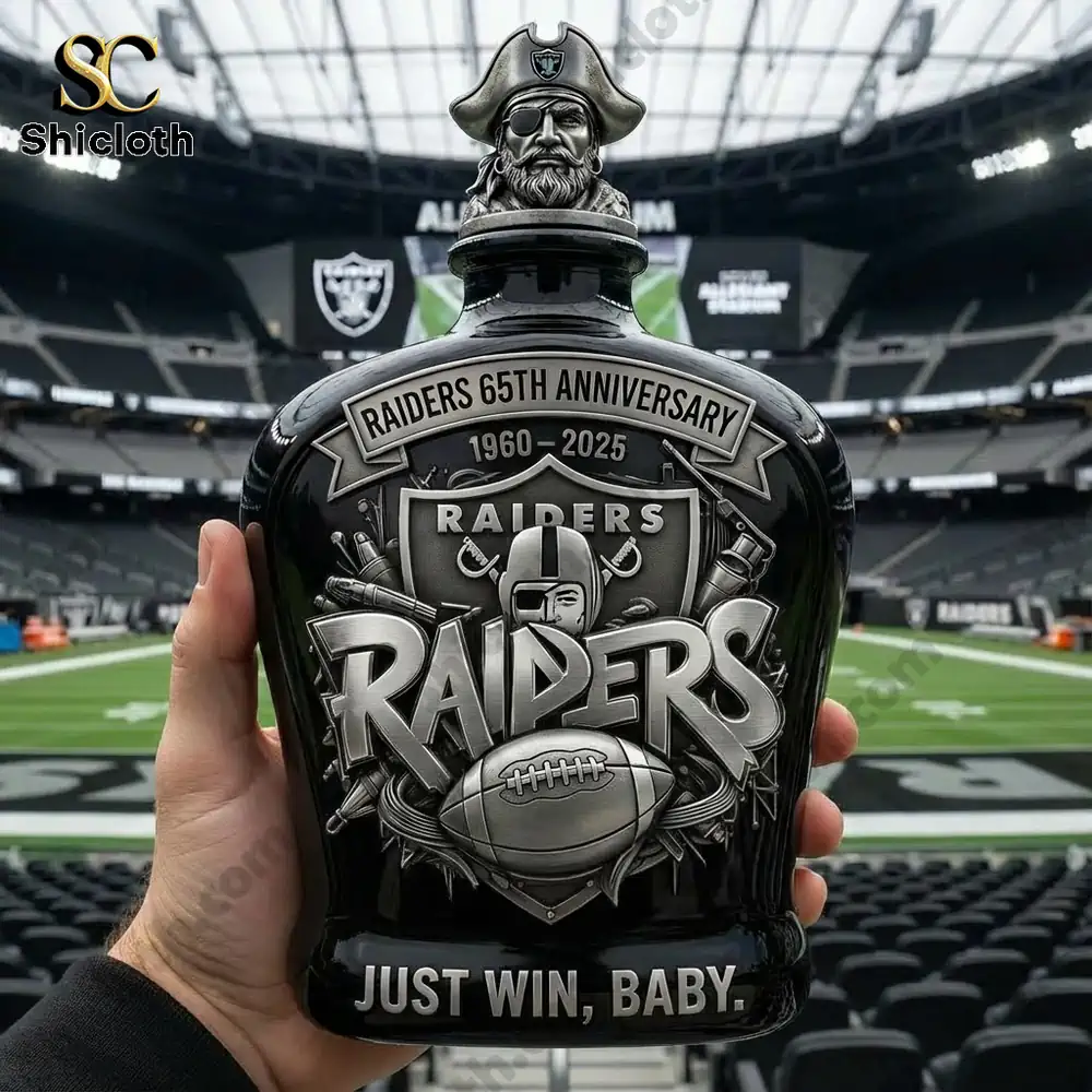 Las Vegas Raiders 65th Anniversary Just Win, Baby whiskey bottle held in front of Allegiant Stadium.
