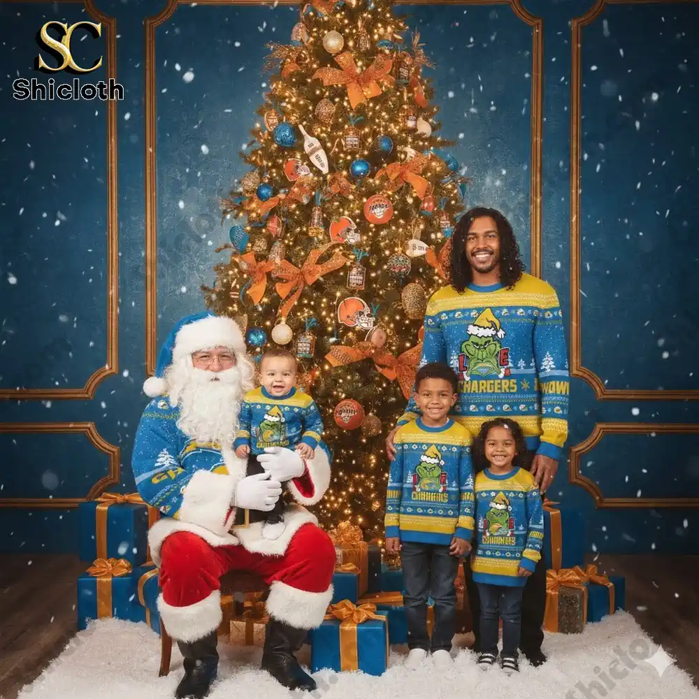 Los Angeles Chargers The Grinch wearing a Santa Claus hat Ugly Christmas Sweaters