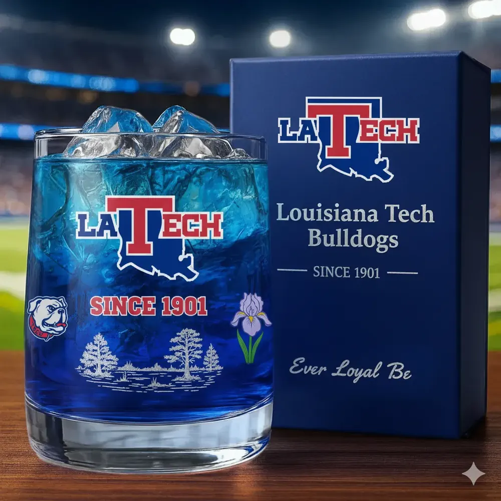 Louisiana Tech Bulldogs Christmas Whiskey Glass 3 A Louisiana Tech themed blue drink glass with ice placed in front of a matching branded gift box.