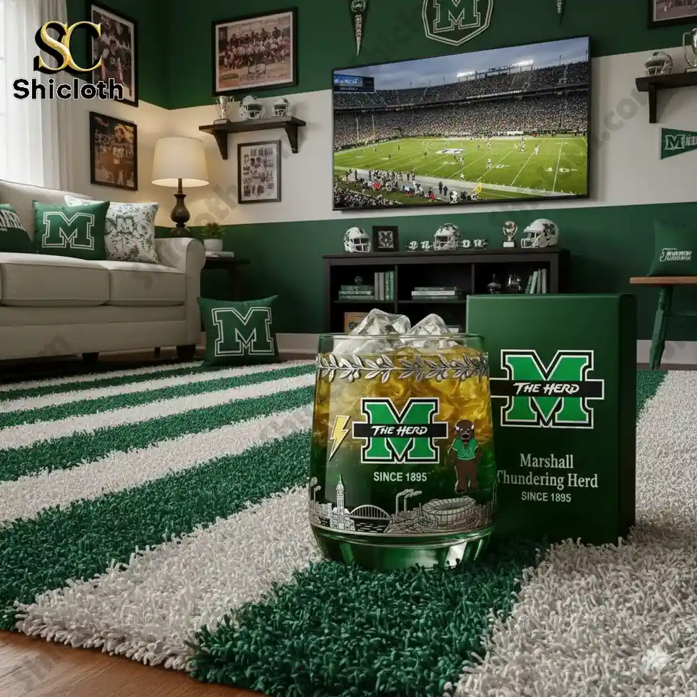 A living room decorated in Marshall team colors with a themed glass on a striped rug!