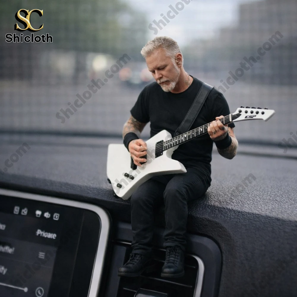 A miniature man playing electric guitar on a car dashboard scene for Shicloth!