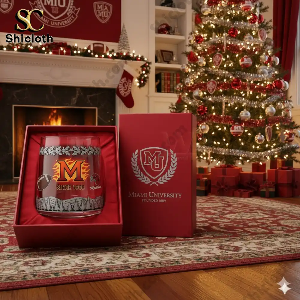 A festive Miami University-themed living room with Christmas decorations, a tree, and a RedHawks candle in a red box.