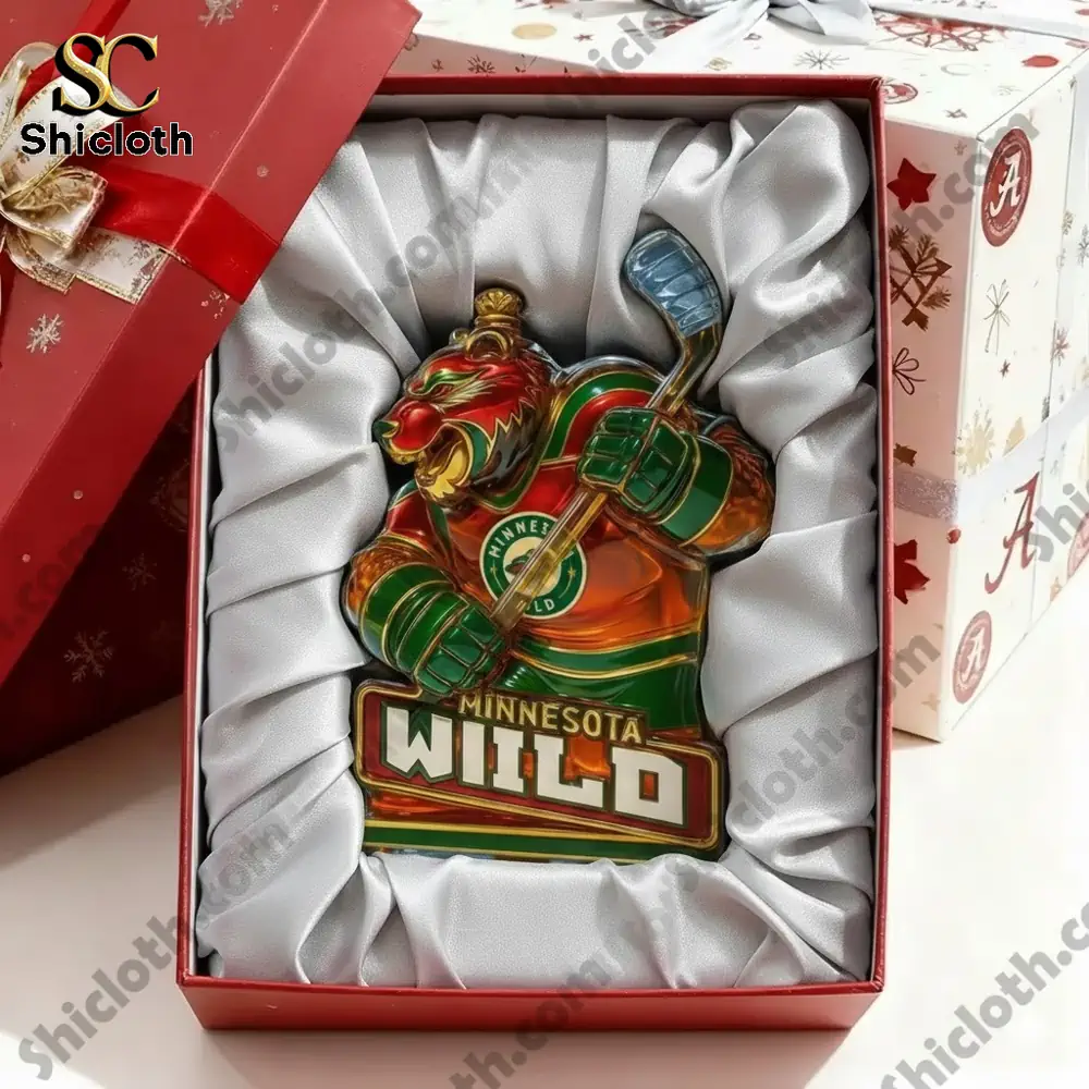 A Minnesota Wild bear figure rests inside a padded gift box.