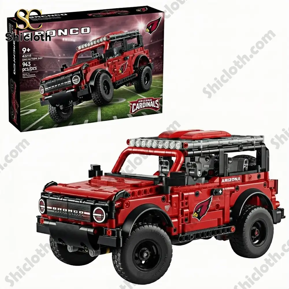 All Teams NFL x Bronco 60th Anniversary Collector Brick Set 4 A toy brick vehicle in red themed for the Arizona Cardinals displayed with its box on a field background!