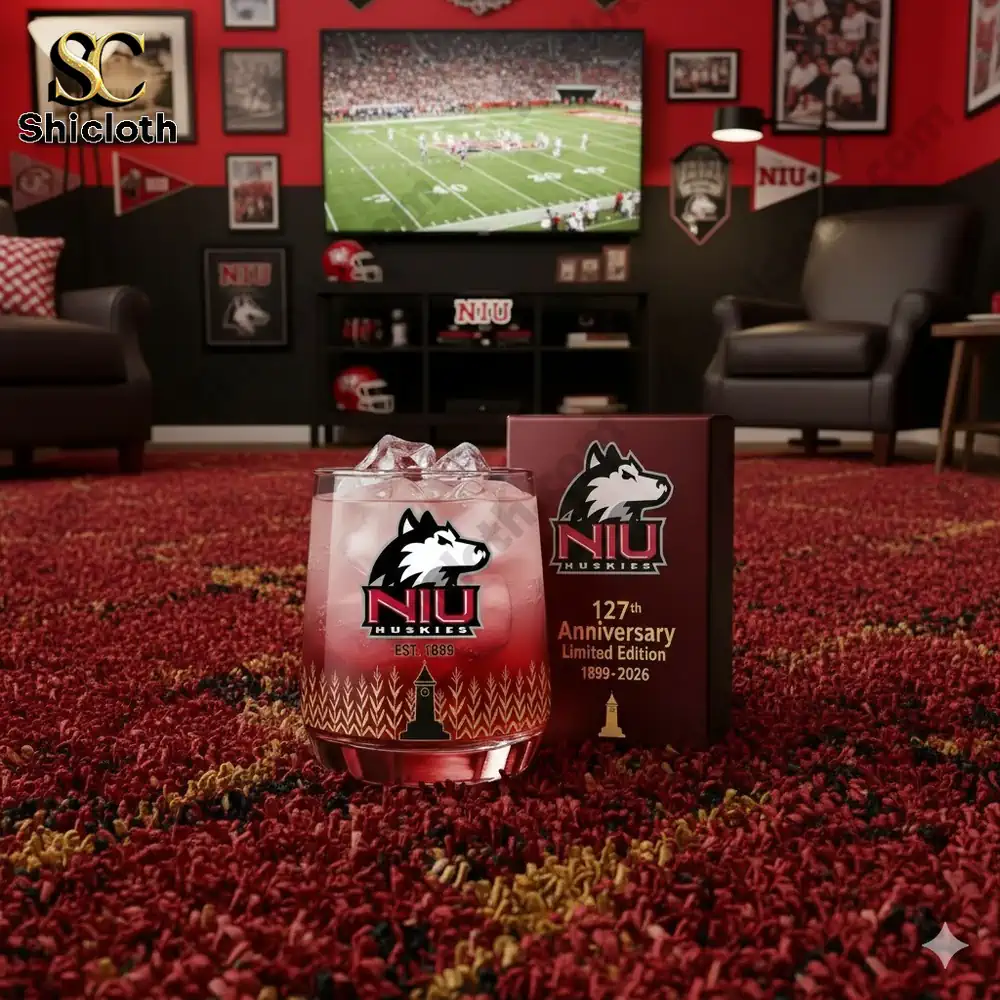 NIU Huskies anniversary whiskey glass in a football themed living room!