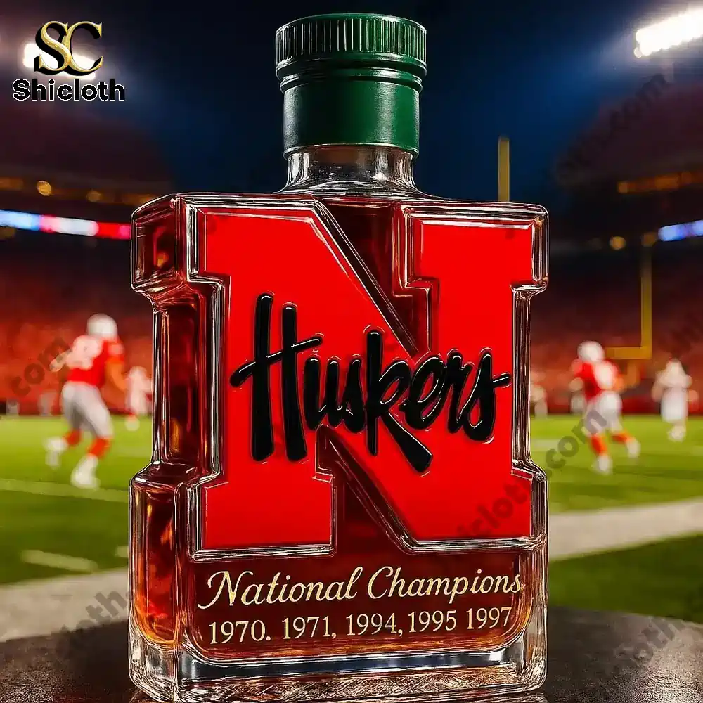 Nebraska Cornhuskers 5-Time National Champions Christmas Gift Whiskey Bottle 3 Nebraska Huskers N shaped bottle with a green cap on a football field!