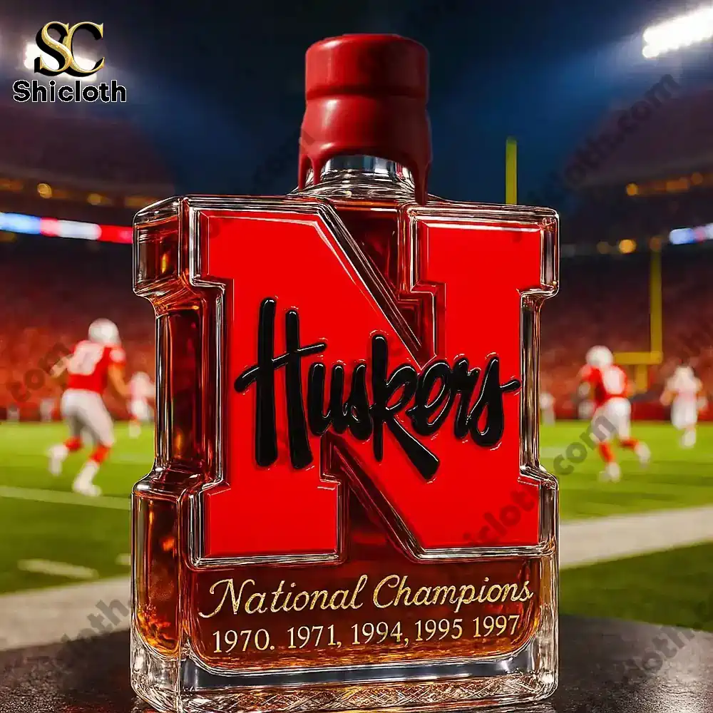 Nebraska Cornhuskers 5-Time National Champions Christmas Gift Whiskey Bottle 7 Nebraska Huskers N shaped bottle with a red cap on a football field!