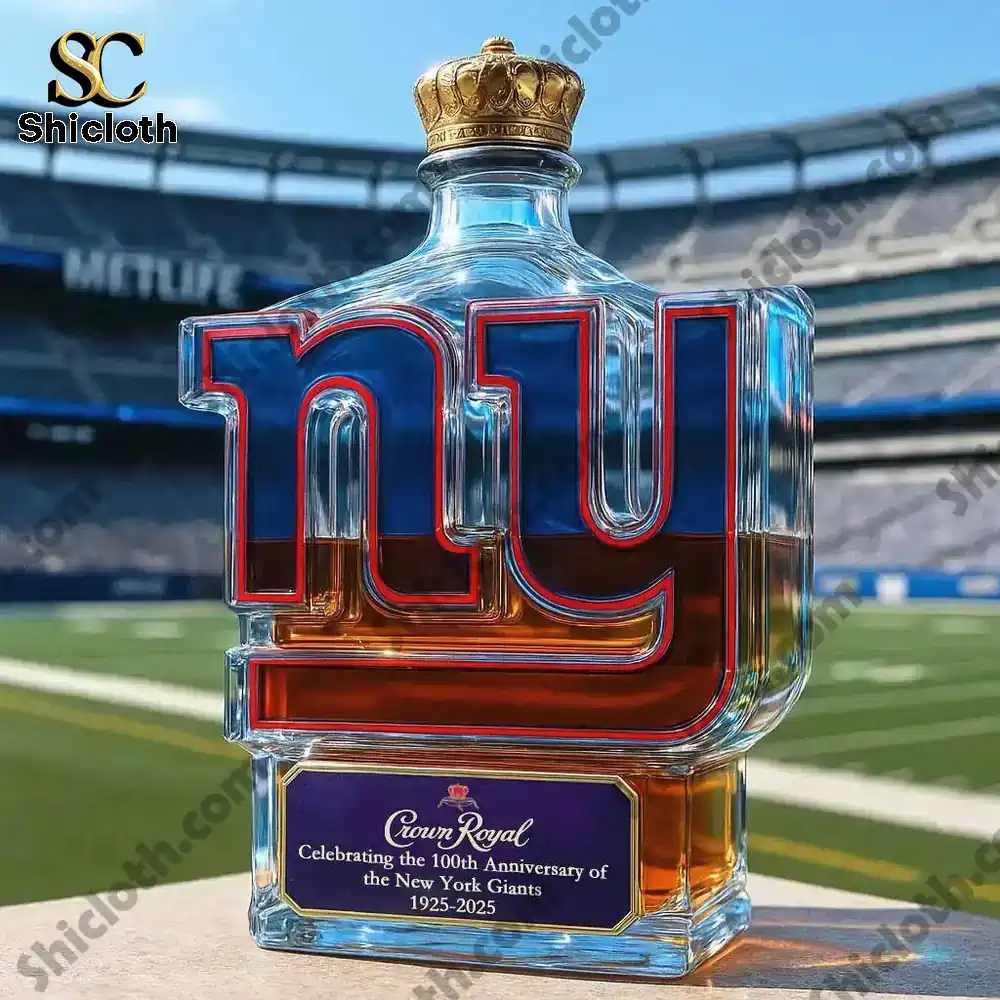 New York Giants 100th Anniversary Whisky Collector's Edition Bottle 5 A New York Giants logo shaped whisky bottle placed on a football field celebrating the team centennial.