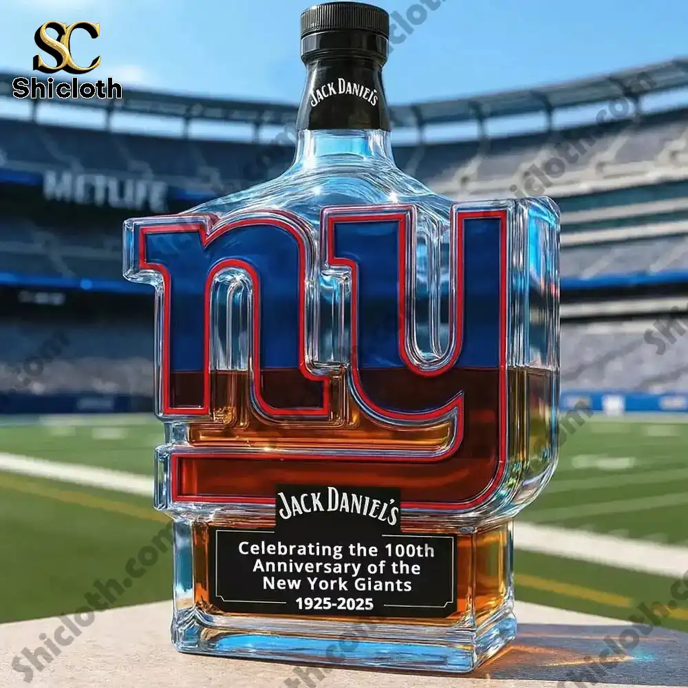 New York Giants 100th Anniversary Whisky Collector's Edition Bottle 6 A New York Giants logo shaped whisky bottle styled after Jack Daniels shown on a football field.