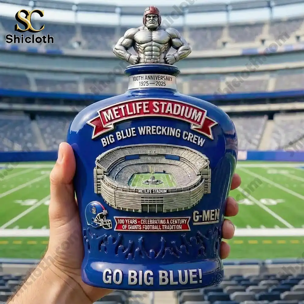 Close-up of the New York Giants MetLife Stadium Big Blue Wrecking Crew whiskey bottle with the stadium in the background.