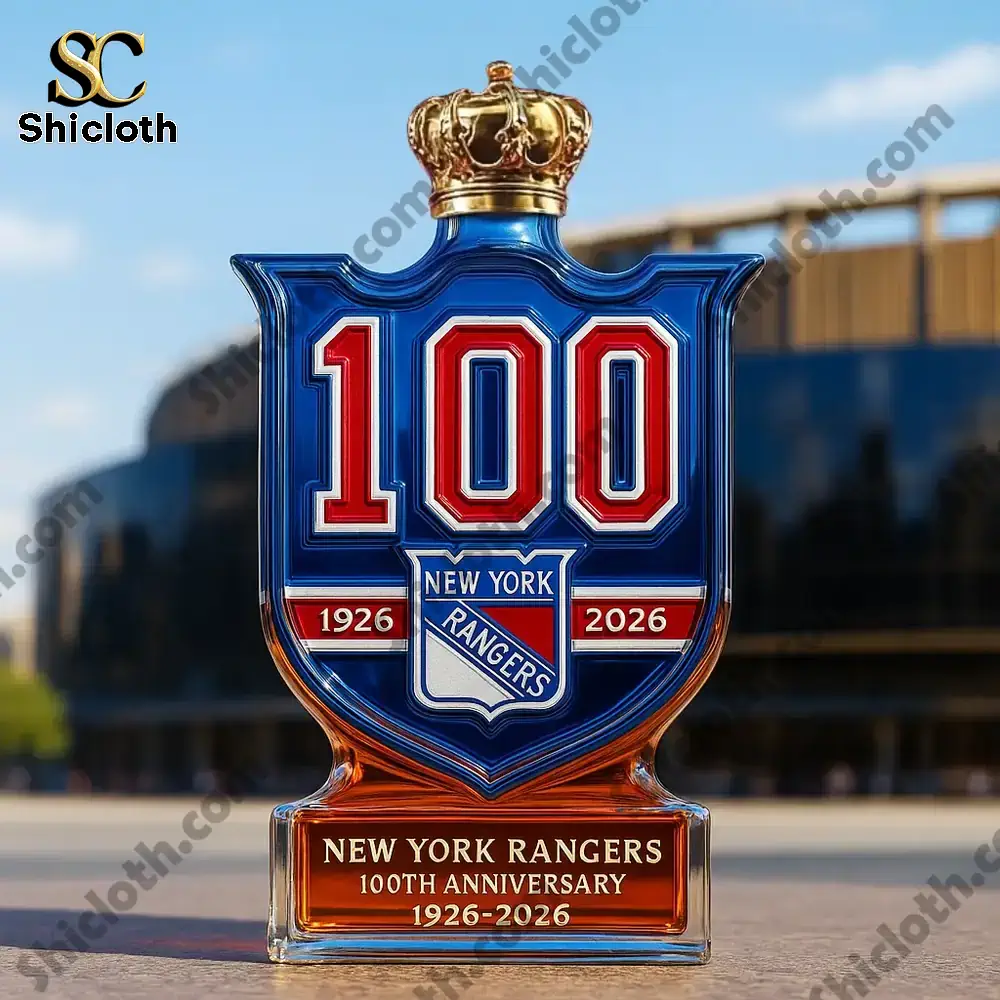 New York Rangers 100th anniversary bottle with a crown top displayed outdoors.