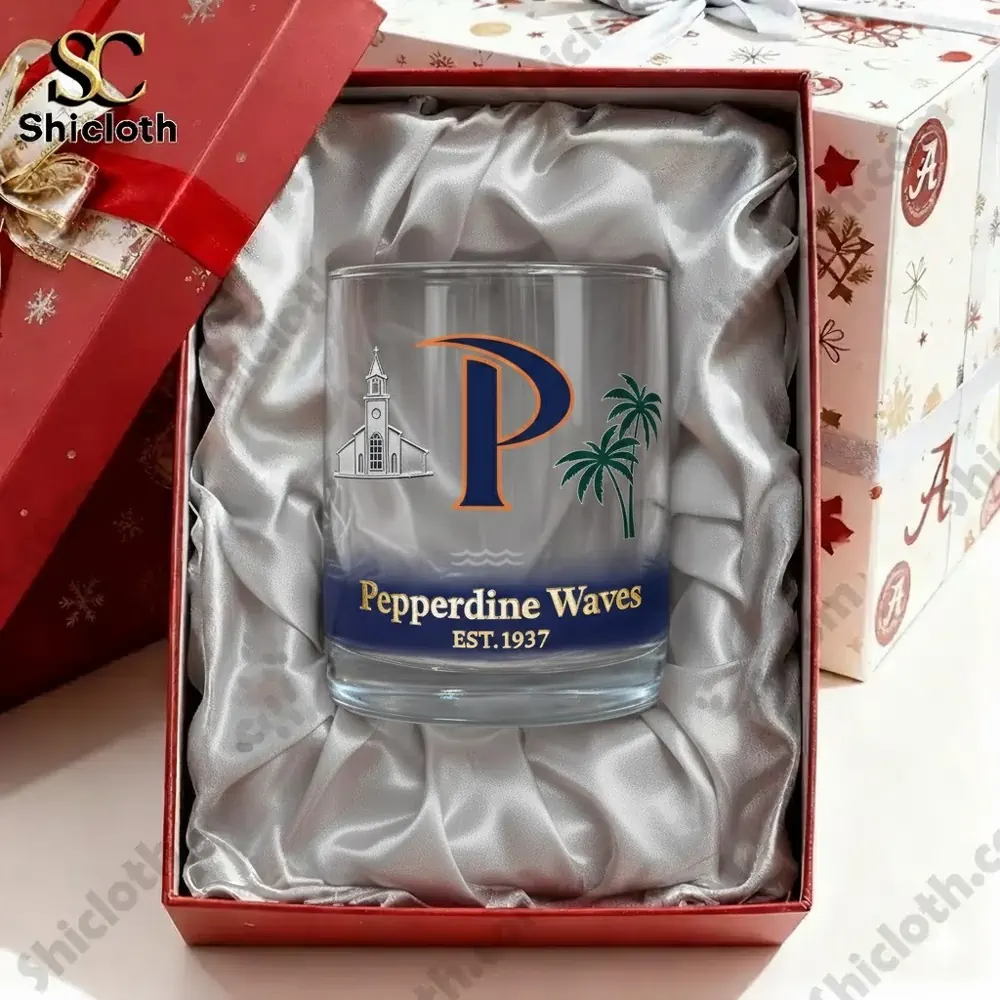 A Pepperdine Waves whiskey glass displayed inside a satin lined gift box!