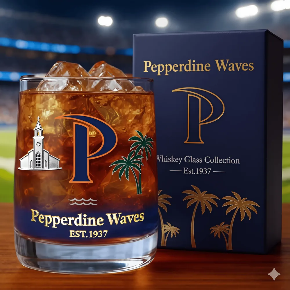 Pepperdine Waves Christmas Whiskey Glass 3 A Pepperdine Waves whiskey glass with ice beside its branded box in a stadium setting!