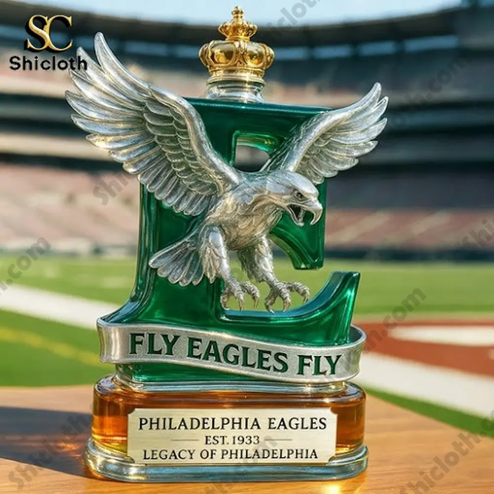 A close-up of a Philadelphia Eagles trophy with a crown and eagle figure.