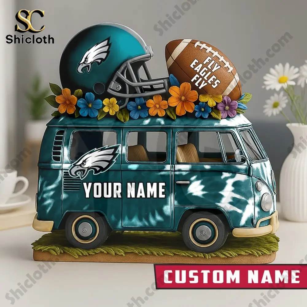 Philadelphia Eagles themed decorative van with helmet and football on top.