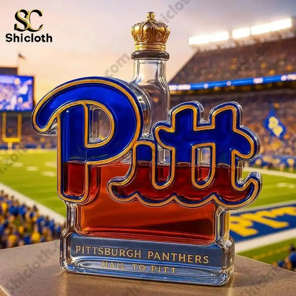 A close-up of the Pittsburgh Panthers whiskey bottle in front of a football stadium.