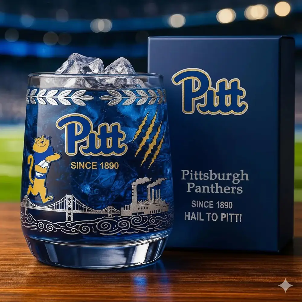 Pittsburgh Panthers Christmas Whiskey Glass 3 A Pitt themed glass filled with blue ice placed beside a matching Pitt box.