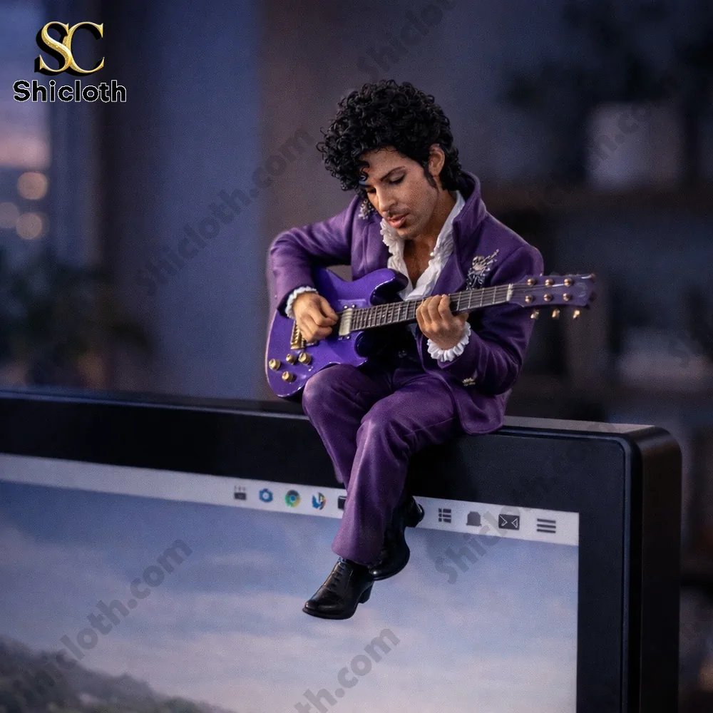 Purple suit musician figurine playing guitar on computer screen!