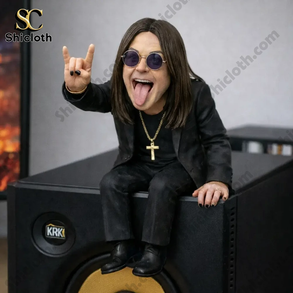 Rock singer desk companion figure sitting on studio speaker!