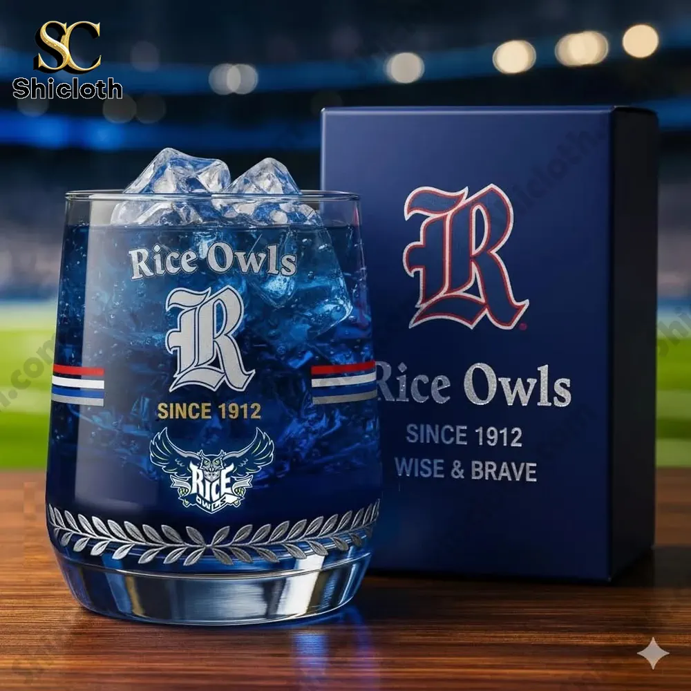A close view of a blue Rice Owls themed drink glass with ice next to its box.
