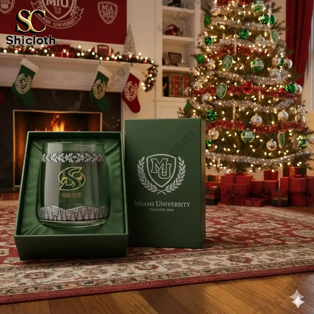 A festive living room with a Christmas tree and a personalized Sac State Hornets whiskey glass in front of a fireplace.