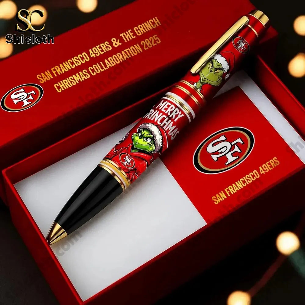 A red pen themed with a green grinch and a football team logo in a gift box!