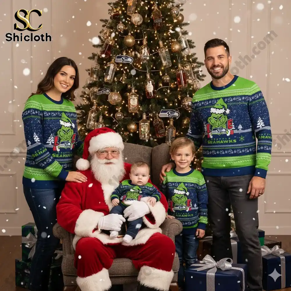 Seattle Seahawks The Grinch wearing a Santa Claus hat Ugly Christmas Sweaters