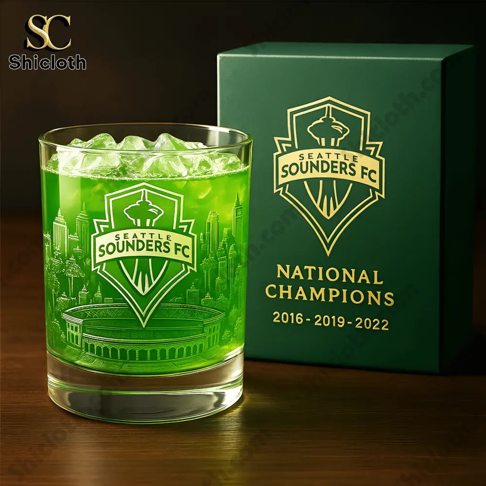Green Seattle Sounders glass with branded box on wooden table!