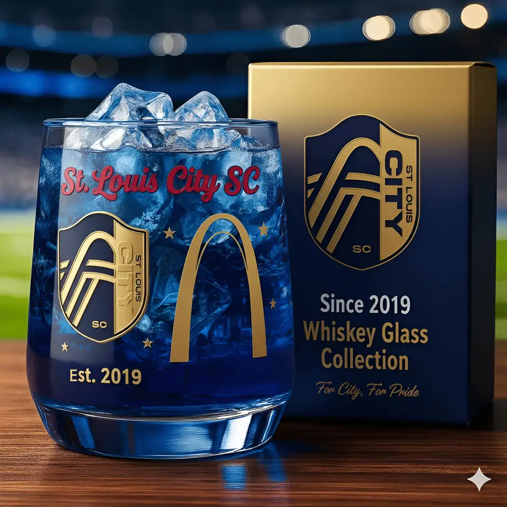 St. Louis City SC Christmas Whiskey Glass 3 A St Louis City SC glass filled with blue ice beside its branded product box!