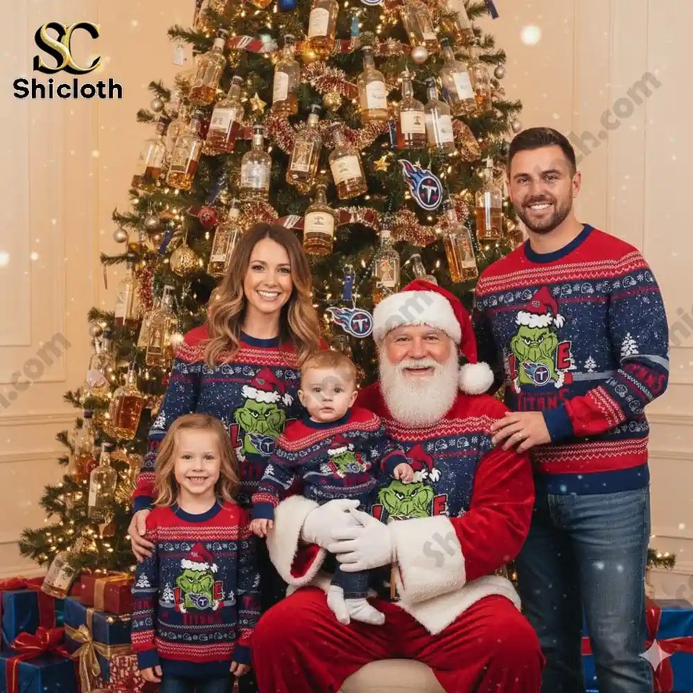 Tennessee Titans The Grinch wearing a Santa Claus hat Ugly Christmas Sweaters