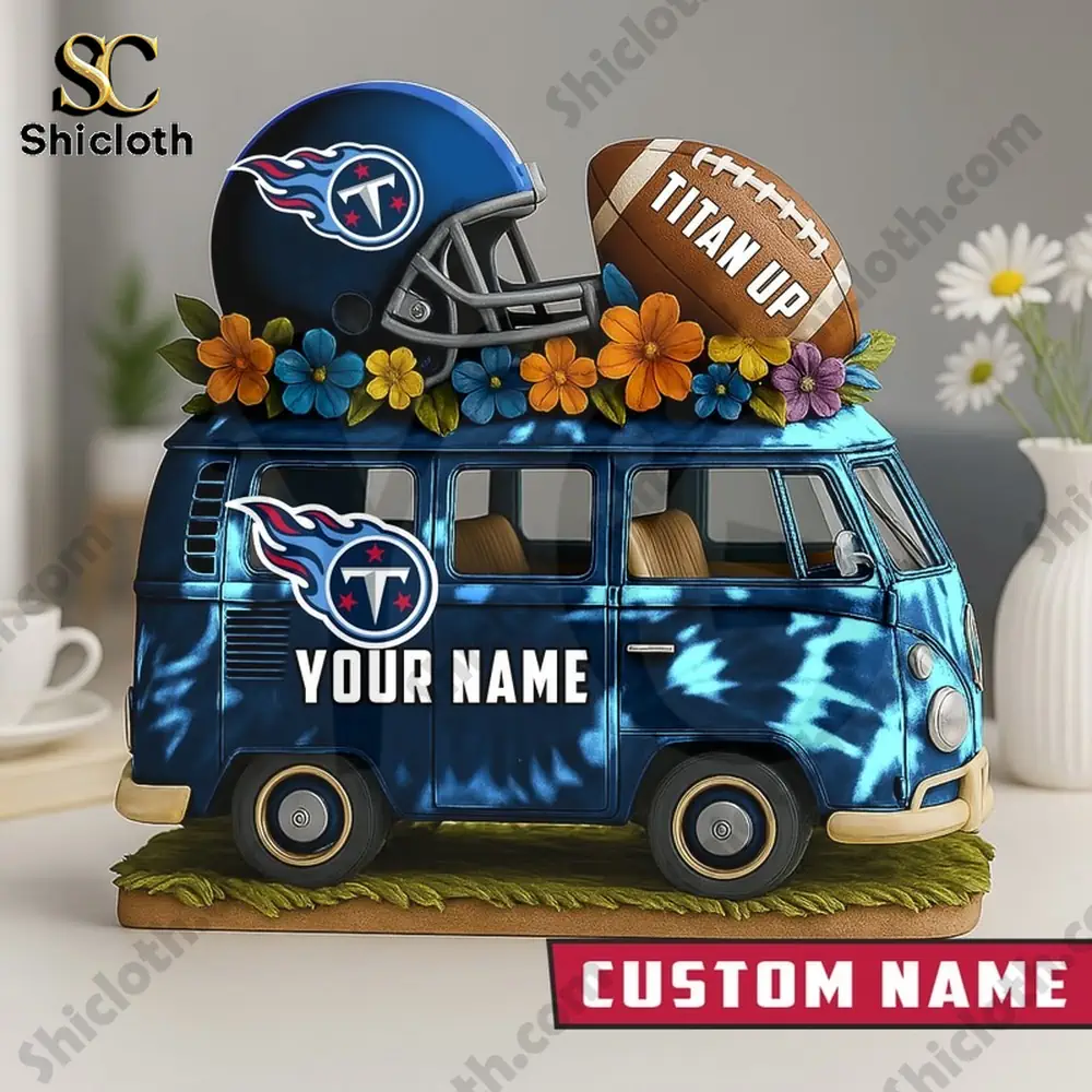 A blue van with a Titans helmet and football on top!