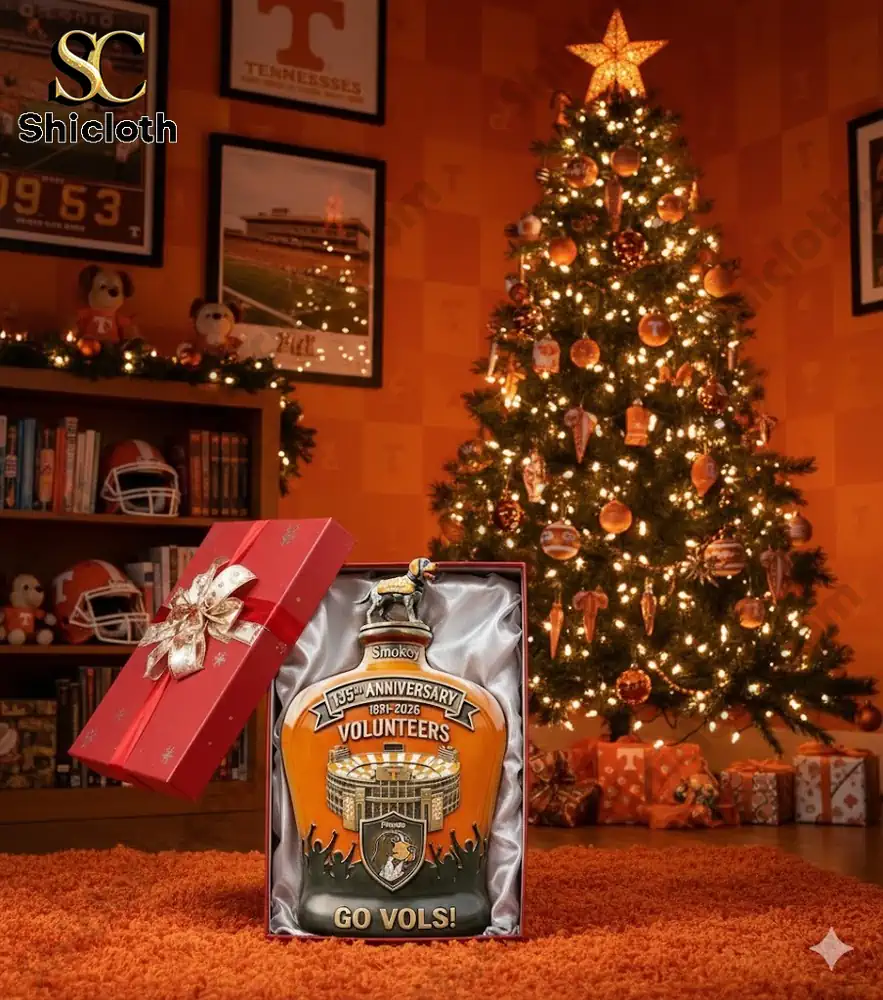 Tennessee Volunteers whiskey decanter in a Christmas setting with a decorated tree and holiday gifts.